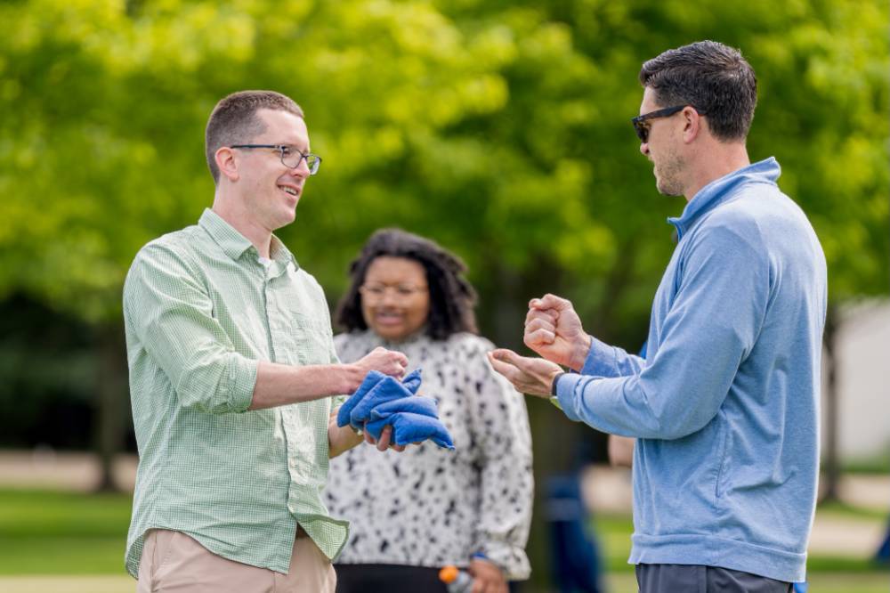 Players play rock paper scissors to start a game